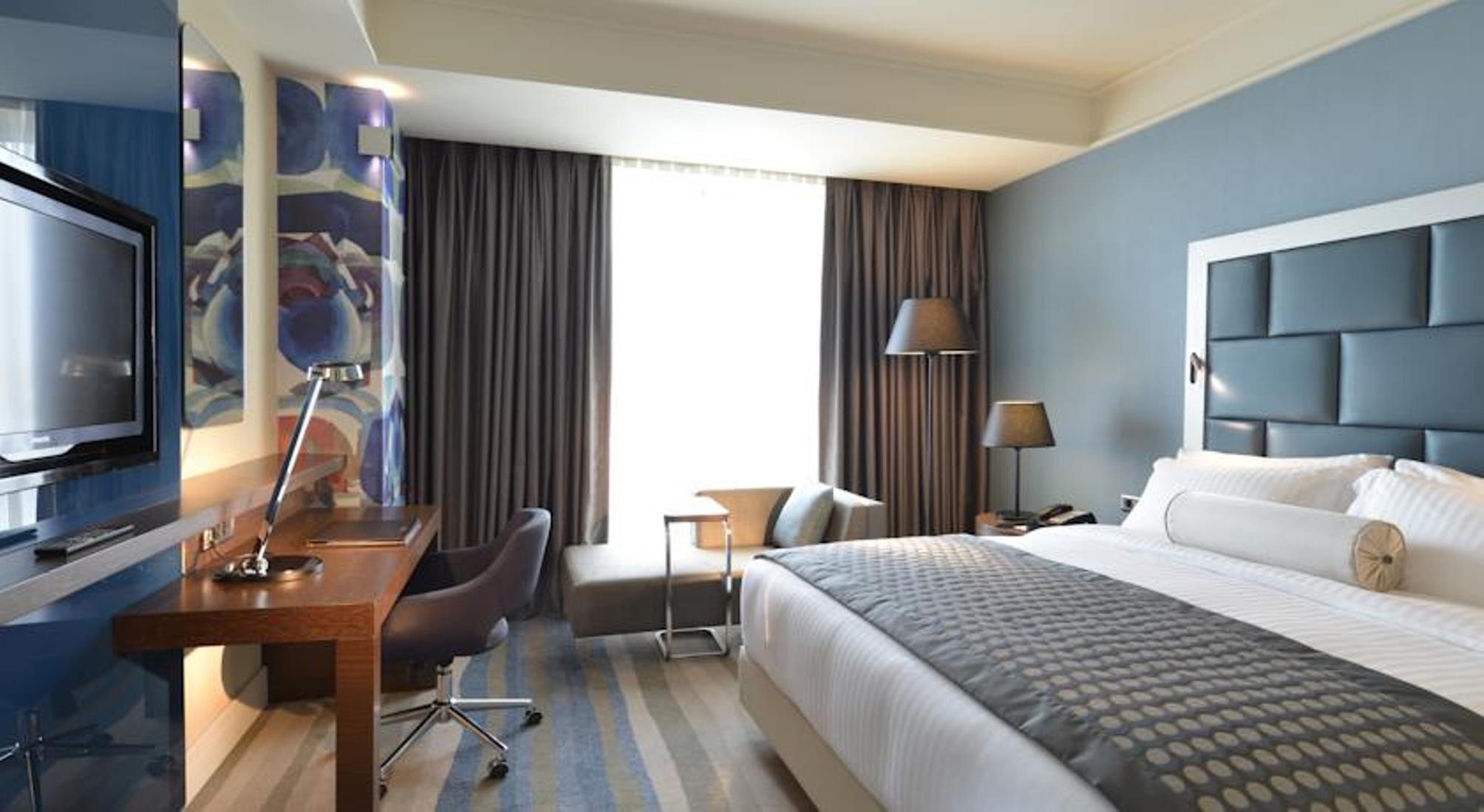 Hotel Wyndham Grand Istanbul Europe Exterior foto A room at the hotel